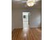 View of bedroom showcasing a ceiling fan and a glimpse into the bathroom at 2235 Grand Cypress Dr # 561, Lakeland, FL 33810