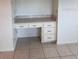 Built-in desk area with drawers and a countertop, ideal for a home office setup at 2235 Grand Cypress Dr # 561, Lakeland, FL 33810