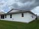 Well-maintained home with a lush green lawn and a simple, clean exterior design at 2235 Grand Cypress Dr # 561, Lakeland, FL 33810