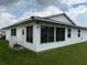 Well-maintained home with enclosed back porch area, perfect for enjoying the outdoors at 2235 Grand Cypress Dr # 561, Lakeland, FL 33810