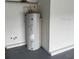Water heater closet with updated water heater and plumbing at 2235 Grand Cypress Dr # 561, Lakeland, FL 33810