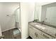 Bathroom with granite countertop and modern fixtures at 2517 Sunset Dr, Winter Haven, FL 33881