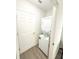 Compact laundry area with a stackable washer and dryer unit at 2517 Sunset Dr, Winter Haven, FL 33881