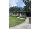 Charming single-story home with a well-maintained lawn and inviting walkway at 2708 Dixie Rd, Lakeland, FL 33801