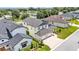 Aerial view of this home showing the driveway, landscaping and surrounding neighborhood at 2736 Sunrise Landing Ln, Lakeland, FL 33812