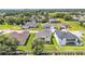 Expansive aerial view of the neighborhood showing a variety of home styles and landscaping at 2736 Sunrise Landing Ln, Lakeland, FL 33812