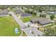 Aerial shot of Sunrise Landing entrance, showcasing the community's gate and landscaping at 2736 Sunrise Landing Ln, Lakeland, FL 33812