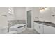 Bright bathroom with jacuzzi tub, walk-in shower and double vanity sink at 2736 Sunrise Landing Ln, Lakeland, FL 33812