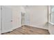 Open bedroom with wood flooring, and natural light at 2736 Sunrise Landing Ln, Lakeland, FL 33812