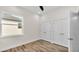 Bedroom features wood flooring and double closets at 2736 Sunrise Landing Ln, Lakeland, FL 33812