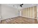 Spacious bedroom with modern ceiling fan, hardwood floors, and neutral paint scheme at 2736 Sunrise Landing Ln, Lakeland, FL 33812