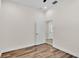Clean, bright bedroom with hardwood floors, white walls, and new trim at 2736 Sunrise Landing Ln, Lakeland, FL 33812