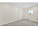 Unfinished bedroom features a window and tile flooring; electrical and plumbing incomplete at 2736 Sunrise Landing Ln, Lakeland, FL 33812