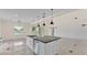 Spacious kitchen island with stainless dishwasher offers modern convenience and ample counter space at 2736 Sunrise Landing Ln, Lakeland, FL 33812