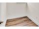Small, unfinished room with wood-look flooring and white trim at 2736 Sunrise Landing Ln, Lakeland, FL 33812