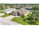 Charming single-Gathering home with a well-maintained lawn and a spacious two-car garage at 2812 Whitney St, Lakeland, FL 33813