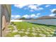 Spacious backyard with a well-maintained lawn and partial paving stones at 2812 Whitney St, Lakeland, FL 33813