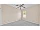Bedroom with neutral carpet and a ceiling fan at 2812 Whitney St, Lakeland, FL 33813