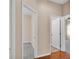 Hallway with a view to the closet and bedroom at 2812 Whitney St, Lakeland, FL 33813