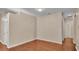 Bright living room featuring beautiful hardwood floors and neutral paint at 2812 Whitney St, Lakeland, FL 33813