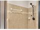 This bathroom features a tiled shower with upgraded shower head at 2812 Whitney St, Lakeland, FL 33813