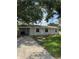 Charming one-story home with a well-maintained lawn and covered parking at 29 Coleman Rd, Winter Haven, FL 33880