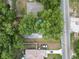 Aerial view of property with a swimming pool in the yard at 3015 Thornhill Rd, Winter Haven, FL 33880