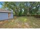 Exterior view of house with a fenced in backyard at 3015 Thornhill Rd, Winter Haven, FL 33880