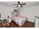 Bedroom featuring a bed, ceiling fan, and stylish decor at 3015 Thornhill Rd, Winter Haven, FL 33880