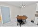 Dining area featuring wooden table and views of the rest of the house at 3015 Thornhill Rd, Winter Haven, FL 33880