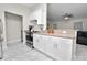 Modern kitchen with white cabinets, stainless steel appliances, and stylish countertops at 3015 Thornhill Rd, Winter Haven, FL 33880