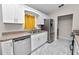 Updated kitchen featuring stainless steel appliances, white cabinets, and stylish countertops at 3015 Thornhill Rd, Winter Haven, FL 33880