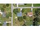 Birds eye view featuring mature trees and residential landscape, with nearby roads at 3560 Sandpiper Ln, Mulberry, FL 33860