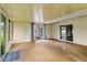 Large sunroom features lots of windows and sliding doors for beautiful views and natural light at 3560 Sandpiper Ln, Mulberry, FL 33860