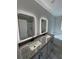 Modern bathroom featuring double sinks, shower and bathtub at 3780 Pioneer Trails St, Lakeland, FL 33810