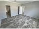 Spacious bedroom with neutral walls and hardwood floors at 3780 Pioneer Trails St, Lakeland, FL 33810