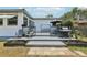 Spacious backyard deck with a seating area and grill, perfect for outdoor entertaining at 3854 Feather Dr, Lakeland, FL 33812