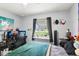 Bright bedroom with a view, decorated with personal touches at 3854 Feather Dr, Lakeland, FL 33812