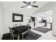 Dining area with table set, seamlessly connected to an updated kitchen at 3854 Feather Dr, Lakeland, FL 33812