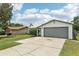 Exterior home featuring a two car garage and a concrete driveway at 3854 Feather Dr, Lakeland, FL 33812