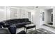 Cozy living room with modern furniture, a neutral color palette, and wood-look floors at 3854 Feather Dr, Lakeland, FL 33812