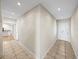 Bright foyer with neutral walls, tile flooring, and decorative front door at 4230 Viola Rd, Lakeland, FL 33810