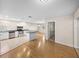 Open concept kitchen with stainless steel appliances and light countertops at 4230 Viola Rd, Lakeland, FL 33810