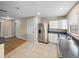 Spacious kitchen featuring modern stainless steel appliances and white cabinets at 4230 Viola Rd, Lakeland, FL 33810