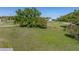 Scenic lot with mature trees, providing a lush backdrop and ample space for outdoor activities and future development at 4230 Viola Rd, Lakeland, FL 33810