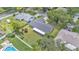 Aerial view of a home with a large yard and swimming pool at 4622 Grovecrest Dr, Lakeland, FL 33813