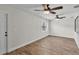 Spacious bedroom with new flooring and two ceiling fans at 4622 Grovecrest Dr, Lakeland, FL 33813
