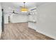 Open-concept living room with tile flooring, recessed lighting, and neutral color palette at 4622 Grovecrest Dr, Lakeland, FL 33813