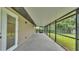 Spacious screened patio overlooking a well maintained fenced yard at 4622 Grovecrest Dr, Lakeland, FL 33813