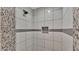 Shower boasts modern tiling and sleek fixtures, adding a touch of luxury to the bathroom at 4622 Grovecrest Dr, Lakeland, FL 33813
